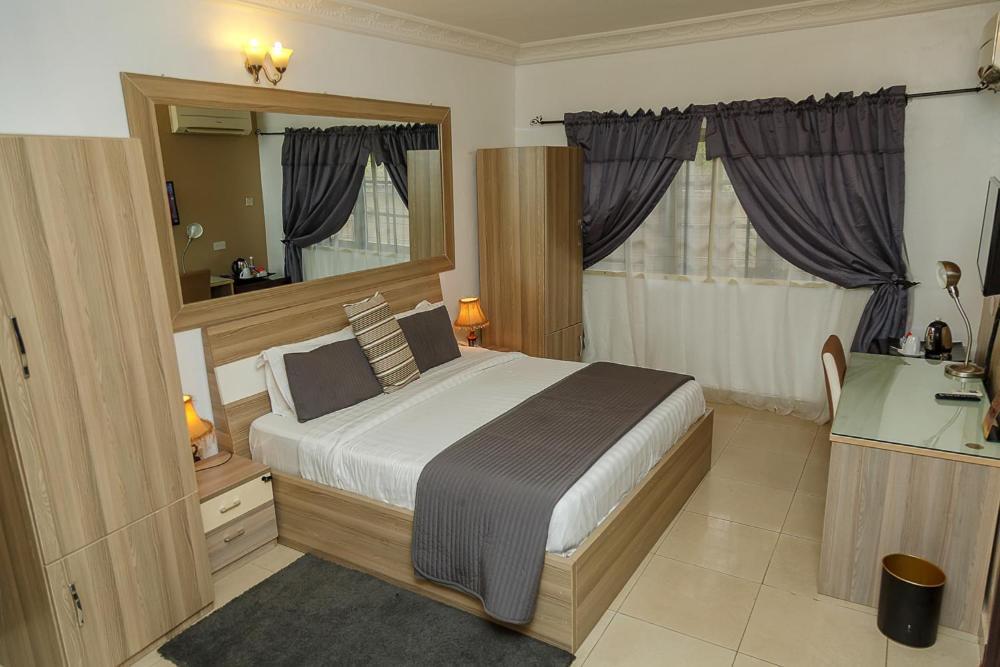 Apartment Royale Hotel&Suite Lagos Extérieur photo